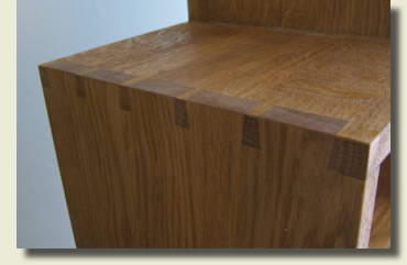 Stepped oak bookcase - detail of exposed dovetails