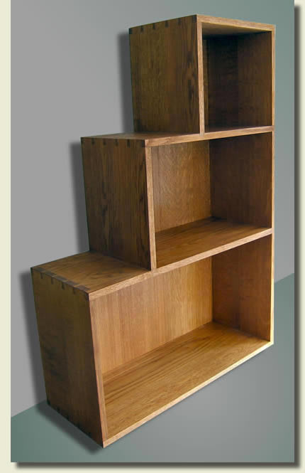 Contemporary stepped bookcase in English Oak